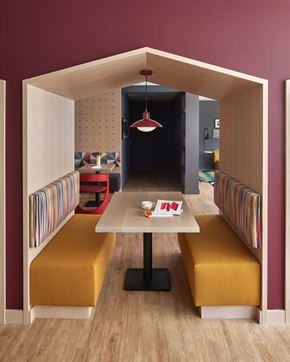 Philadelphia apartment for rent - a dining room with yellow benches and a table