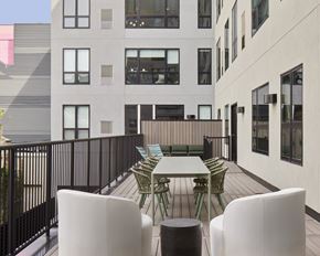 Philadelphia apartment for rent - Patio with a table and chairs at 23 West Apartments, Philadelphia, PA, 19123