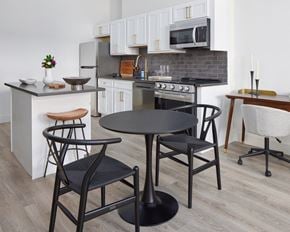 Philadelphia apartment for rent - a kitchen and dining area with a table and chairs