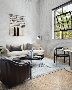 Philadelphia apartment for rent - a living room with a couch and a table