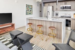 Philadelphia apartment for rent - a kitchen and living room with a bar and stools