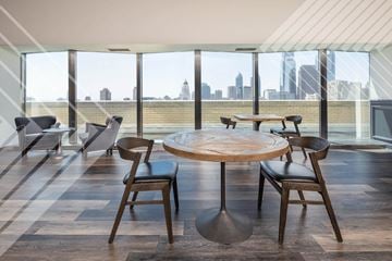 Philadelphia apartment for rent - A modern dining room with a round table and chairs.