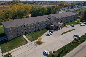 Pleasant Hill apartment for rent - a large building with a parking lot in front of it