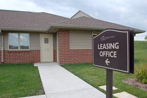 West Des Moines apartment for rent - a house with a leasing office sign in front of it