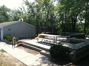 Des Moines apartment for rent - a patio with a picnic table and a fire hydrant