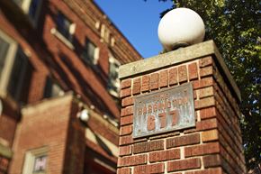 Des Moines apartment for rent - a brick pillar with a sign on it that reads the harrington 617