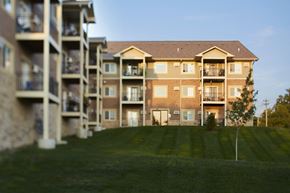 Des Moines apartment for rent - an apartment building with balconies and a lawn
