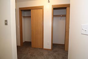 Waukee apartment for rent - an empty room with two doors