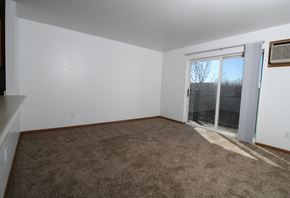 Altoona apartment for rent - a living room with a door to a balcony