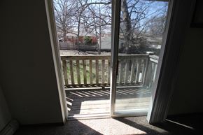 Des Moines apartment for rent - a sliding glass door with a view of the deck