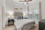 San Antonio apartment for rent - Modern bedroom with upholstered headboard and nightstands at Urban Crest Apartments, San Antonio, 78209