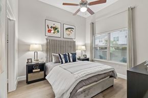 San Antonio apartment for rent - Modern bedroom with upholstered headboard and nightstands at Urban Crest Apartments, San Antonio, 78209