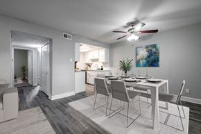 Dallas townhouse for rent - A dining room with a table set for four.