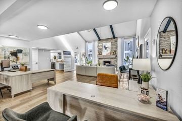 Austin apartment for rent - a living room with a table and a mirror