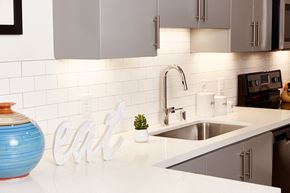 Los Angeles apartment for rent - a white kitchen with a sink and a counter top