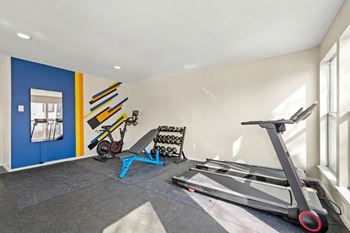 The gym at the central apartments near uptown and downtown