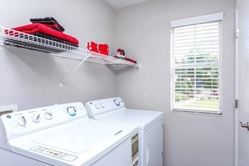 Laundry room w/ washer & dryer