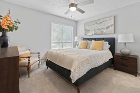 Arlington apartment for rent - a bedroom with a bed and a ceiling fan at District 2308, Arlington ?