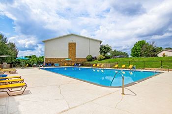 Sparkling swimming pool with sundeck