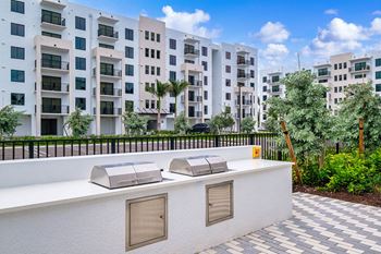 A rendering of an apartment balcony with three stainless steel bunks