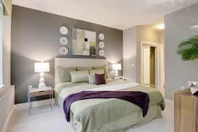 Alexandria apartment for rent - a bedroom with a bed and a mirror on the wall