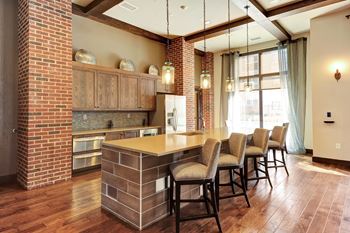 Elaborate resident lounge and clubroom equipped with gourmet serving kitchen