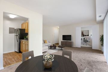 Capitol Heights apartment for rent - A modern living room with a dining table and chairs.