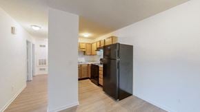 Louisville apartment for rent - a kitchen with a refrigerator and a stove and