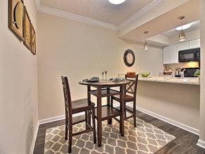 Evansville apartment for rent - a dining room with a table and chairs