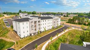 Louisville apartment for rent - an aerial view of an apartment building on a street