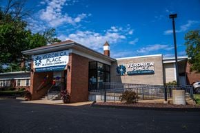 Florissant apartment for rent - a building with a sign that says verona place