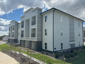 Louisville apartment for rent - Apartment building with a walkway in front.