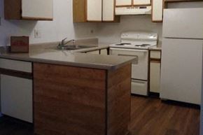 Mchenry apartment for rent - a kitchen with white appliances and a counter top