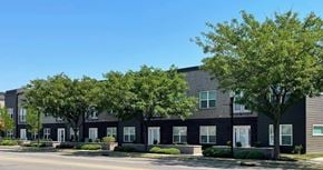 Clarksville apartment for rent - A row of houses with trees in front.