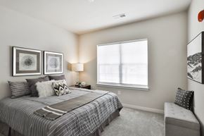 Lake St Louis apartment for rent - a bedroom with a bed and a window  at Aventura at Hawk Ridge, Lake St Louis, 63367