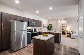 Wentzville apartment for rent - Gormet kitchen with stainless steel appliances and a island at Aventura at Wentzville, Wentzville, MO