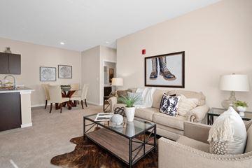 Wentzville apartment for rent - a living room with a couch and a coffee table