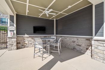 Poolside cabana with grilling patio