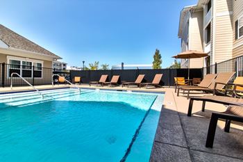 Private swimming pool with sun deck