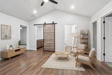 Sturgeon Bay apartment for rent - A living room with a sliding door and a rug on the floor.