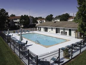 Kalamazoo apartment for rent - A black fence surrounds a small pool.