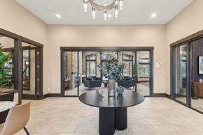 Kennewick apartment for rent - A modern dining room with a round table and chairs.