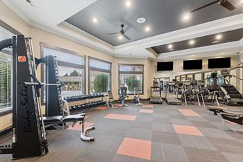 State-of-the-art fitness center with cardio and weight equipment