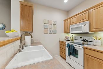 Custom cabinetry in solid alder with raised panel doors