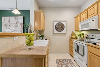 Custom cabinetry in solid alder with raised panel doors