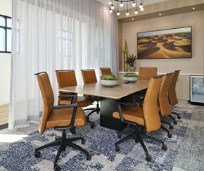 Murrieta apartment for rent - A conference room with a large table surrounded by chairs.