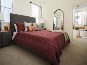 Phoenix apartment for rent - a bedroom with a bed and a mirror