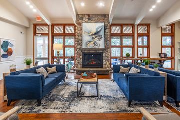 Spokane Valley apartment for rent - the living room of a house with couches and a fireplace