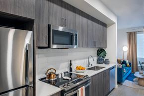 Las Vegas apartment for rent - a kitchen with stainless steel appliances and a sink