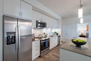 Quartz countertops & subway tile backsplashes
